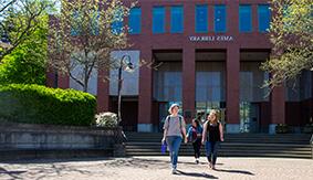 Three students walking in front of SPU
